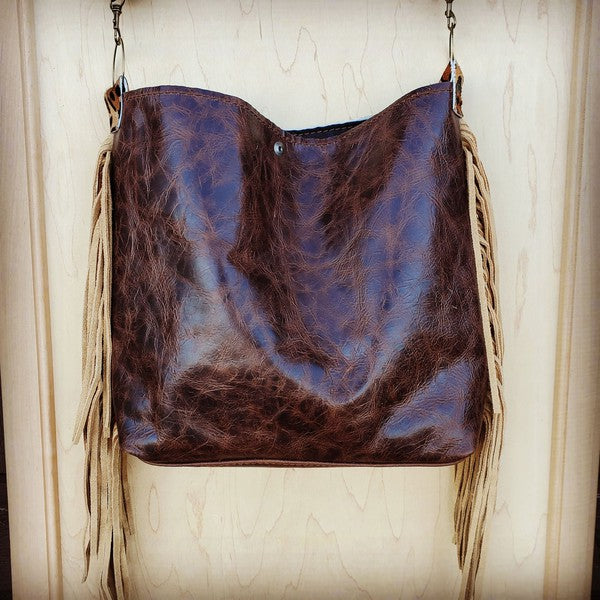 Tejas Leather Bucket Leopard bag with Tan Fringe